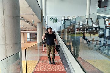 Image showing A videographer arrives to recording promotional footage for the company, embodying creativity, innovation, and the essence of contemporary marketing strategies.