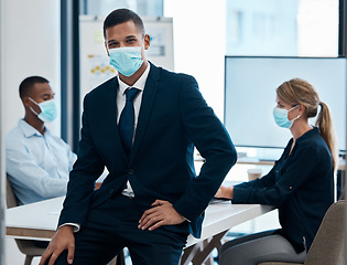 Image showing Businessman with covid face mask in meeting, leader in training workshop and coaching employees in compliance with rules and regulations at work. Portrait of manager, boss or worker in management