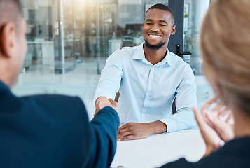 Image showing Shaking hands, interview and business people give a handshake after hiring a new company employee. Onboarding, thank you and management welcome young African worker a job promotion in office meeting