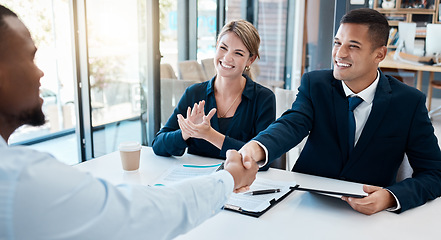 Image showing Business meeting, merger and agreement at corporate desk with positive and successful result. Partnership, trust and respect gesture with hands in professional deal with b2b cooperation.