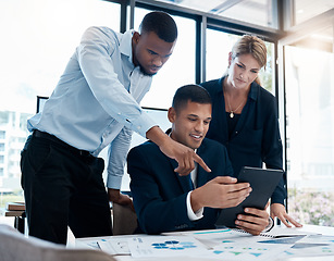 Image showing Business people planning on tablet in meeting, talking about finance collaboration and check for financial data on the internet online in work office. Accountants working on accounting strategy