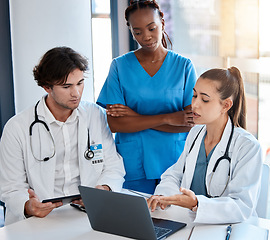 Image showing Teamwork, doctors and collaboration on laptop during a meeting in a conference room. Diverse healthcare workers discussing modern treatment and innovation, brainstorming to find a cure for sickness