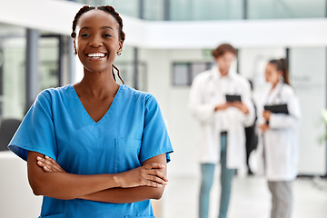 Image showing Nurse, healthcare and medicine with a woman working in healthcare for health, wellness or insurance in a hospital. Portrait of a female medical student or professional standing arms crossed inside