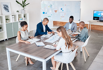 Image showing Business people working on documents and laptop at a office boardroom table. Group of professional, diversity and analysts browsing ideas online and planning and teamwork to prepare in a b2b meeting