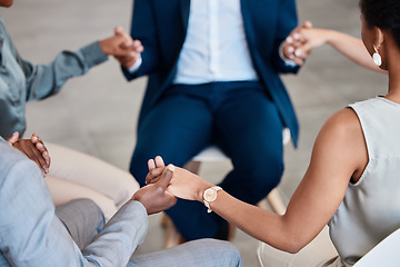 Image showing Support, trust and collaboration with a group of business people holding hands while sitting in circle for a team building workshop. Pray, motivation and diversity in a corporate office or workplace