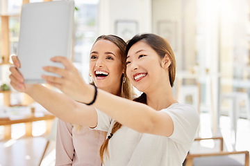 Image showing Tablet, happy and women taking a selfie at work on a break to post it on social media on a network app. Smile, friends and business people on a fun online video call about a digital startup agency