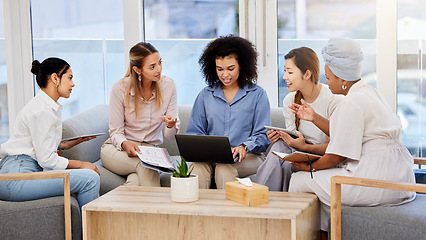 Image showing Startup, strategy and collaboration on laptop with business women group effort for project design in a corporate office. Diverse employee discussing and planning while sharing their opinion and goals