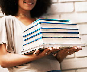 Image showing Education, knowledge and learning student with books for studying, research or assignment on a white wall. Black scholarship, geek or nerd girl with stack of university library textbooks for reading