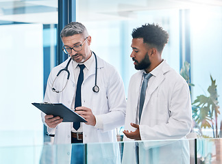 Image showing Doctor , healthcare worker and medical expert talking about health insurance, collaboration in surgery and communication about results at a clinic. Expert employees working on research in hospital