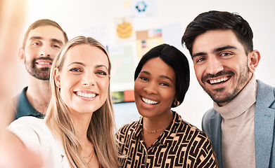 Image showing Creative, corporate and happy team taking a selfie on a phone in office conference room. Portrait of business employee friends taking a picture together on modern smartphone while having fun at work.