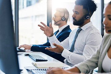 Image showing Call center, customer care and support with a man consultant in a headset working on a computer in his office. Contact us, crm and telemarketing with a male consulting on a call at his work desk