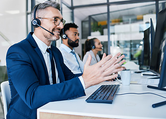 Image showing Call center, customer support and contact us for our telemarketing consulting agents can help with loan advice. Consultant, communication and happy insurance service employee in a suit with a headset