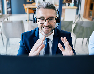 Image showing Call center agent, telemarketing, and customer support consultant wearing a headset and looking happy during zoom video call conference. Contact us and crm operator for friendly service with a smile