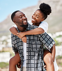 Image showing Love, happy and relax couple on beach date while on travel vacation, holiday or romantic summer honeymoon getaway. Support, romance and partnership for married black man carrying woman on Brazil trip