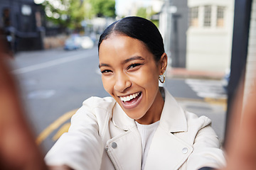 Image showing Girl social media influencer taking a selfie portrait on city street outdoors to post it online. Fashion, swag and young woman with a cool white leather jacket happy, smile and smiling on the road