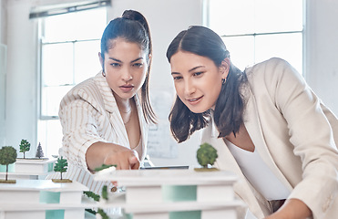 Image showing Architect, team and engineer meeting while women discuss 3d architectural model vision. Teamwork and collaboration while talking and planning construction building prototype design project in office