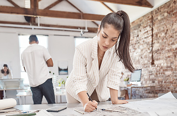 Image showing Architecture, young woman and designer planning building blueprint, construction project and property development in startup agency. Engineering work, industrial creative and focus floor plan expert