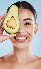 Image showing Avocado, wellness and skincare woman portrait on blue studio background and mockup. Young model with natural organic nutrition diet for face and healthcare with green, clean and healthy lifestyle