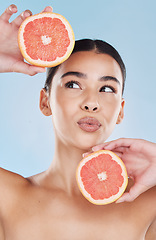Image showing Grapefruit, woman skincare and beauty of vitamin c fruit wellness, healthy complexion and natural feminine grooming. Playful, body nutrition and beautiful model for clean, organic and fresh cosmetics