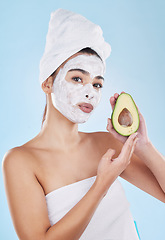 Image showing Skincare, beauty and avocado face mask with a beautiful woman taking care of her clean and healthy skin. Organic, fresh and cleansing facial with routine homemade treatment and natural ingredients