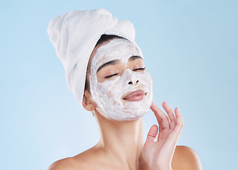 Image showing Skincare woman, beauty facial mask and cosmetics after fresh shower, bathroom grooming routine and bodycare on blue background. Feminine face, clean spa pores and healthy pamper treatment complexion