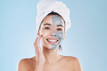 Image showing Beauty, skincare product and face mask with a portrait of a beautiful woman taking care of her clean, healthy and happy skin. Smile, charcoal or clay exfoliate during routine hygiene treatment