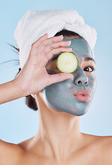 Image showing Facial, acne and woman with face mask for skincare cosmetic wellness treatment therapy in a dermatology portrait. Peeling, cucumber and young girl at a spa cleaning with healthy detox beauty product