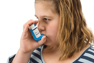 Image showing Girl Taking Inhaler