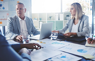 Image showing Serious people in business meeting discussion, planning strategy for company financial report with charts, graph and data. Team manager man and woman listening to review of corporate marketing growth