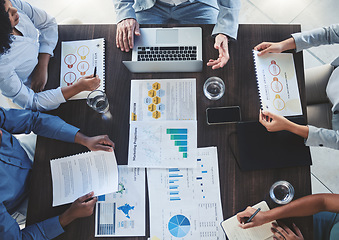 Image showing Team, branding and digital marketing business people in a meeting on sales growth chart, advertising and project goals. Teamwork, collaboration and workers in group conversation on strategy top view