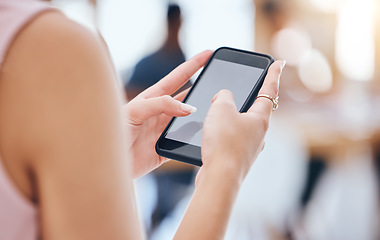 Image showing Woman mock up, blank screen and phone of business person, creative designer and entrepreneur browsing, texting and planning in agency. Closeup of manager check online, internet and app notifications