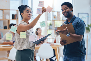 Image showing Sticky notes, planning and collaboration partnership marketing team working on advertising idea for startup business. Strategy, teamwork and support from black employee brainstorming a success plan