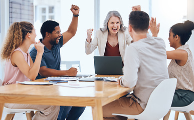 Image showing Business people celebration meeting goal, target and success while cheering during a meeting in a office. Advertising and marketing team happy about company profit and bonus salary from project