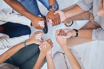 Image showing Support, prayer and trust with hands of people praying in spiritual faith and comfort in a meeting from above. Help, hope and worship with a group sitting in a circle of community and mental health