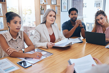 Image showing Business people meeting to talk about data paperwork in an office. Group of marketing professional workers planning a strategy while collaborating to discuss ideas for a project in a creative startup