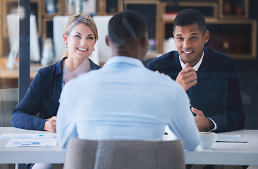 Image showing Business interview in a corporate office with an ambitious employee discuss goal and plan with HR or investor. Professional worker sharing exciting strategy or proposal for business integration