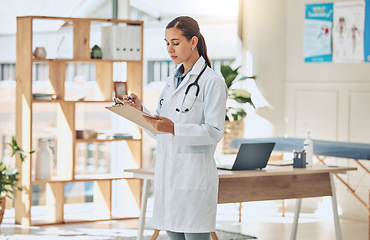 Image showing Doctor writing analysis, reading test results and consulting document information in wellness clinic. Hospital woman, notes and medicine research for healthcare, surgery planning and medical service