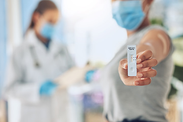 Image showing Hand with pcr covid test at hospital, sick patient doing virus consultation with doctor at hospital and consulting with healthcare worker at clinic. Woman with professional corona exam results