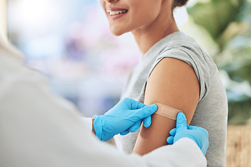 Image showing Band aid, vaccine or injection for covid and global virus in security, safety or wellness insurance. Doctor hands, medical employee or healthcare worker with plaster for happy or smile hospital woman