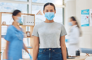 Image showing Covid, mask and medicine with a woman in the hospital and a doctor and nurse in the background for consulting, healthcare and wellness. Medical, trust and help with a female patient in a clinic