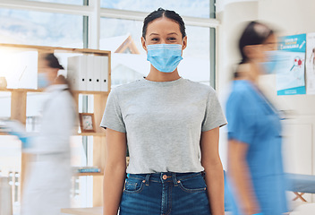 Image showing Compliance, healthcare and covid rules at hospital with a happy patient coming for a checkup with busy doctors. Portrait of a young woman looking excited about the corona vaccine and treatment