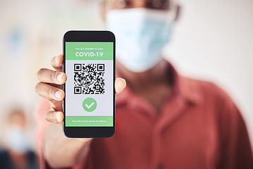 Image showing Covid, QR code and phone in person hand for vaccinated digital verification certificate or passport at an airport, hospital or clinic. Man with smartphone and screen technology for coronavirus safety