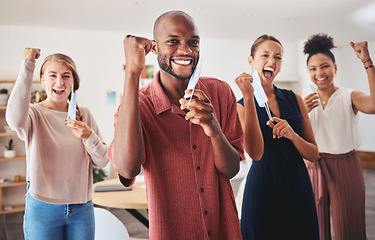 Image showing Business team, celebration and taking mask off at end of covid pandemic at office. Diversity, success and cheering, man and women smile, lockdown is over. Freedom, fresh air and celebrating at work.