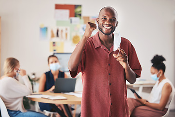 Image showing Face mask, excited business man and covid compliance portrait with motivation vision to stop global danger virus. Smile, happy and success for black office businessman in end of pandemic celebration