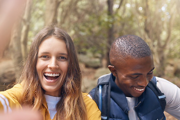 Image showing Happy hiking, freedom and couple selfie in nature forest environment, woods in spring with smile. Workout and exercise with man and woman on sports, fitness and health and wellness mindset walk