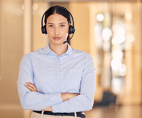 Image showing Call agent, woman and portrait of frown with arms crossed and unhappy face expression at job. Consultant and customer service worker in disappointed, upset or frustrated mood with workplace.