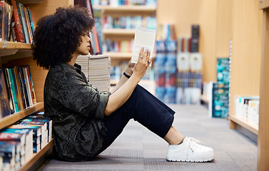 Image showing University, library book and girl student learning, reading and studying by school bookshelf for knowledge and education. Campus, college and young teenager with novel, information and intelligence