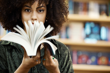 Image showing Scholarship, books and girl student in library learning, studying and reading educational knowledge or information. Young, smart and afro black woman on university or college campus with school novel