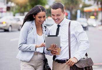 Image showing 5g tablet internet and social media live streaming watching of a couple after work in a city. Happy work friends or partners with a smile looking at a meme, web or blog content on a urban street