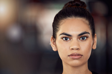 Image showing Beauty, power and face portrait of a woman or model with facial wellness in feminine voice protest over mockup. Serious female in empowerment, strength and courage with makeup over bokeh background.